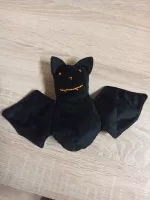 Netopýr s vyšívaným obličejem